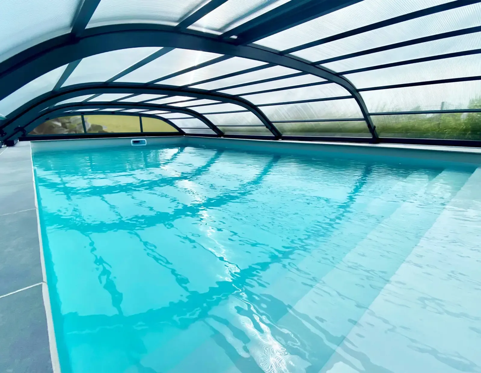 Abri de piscine télescopique
