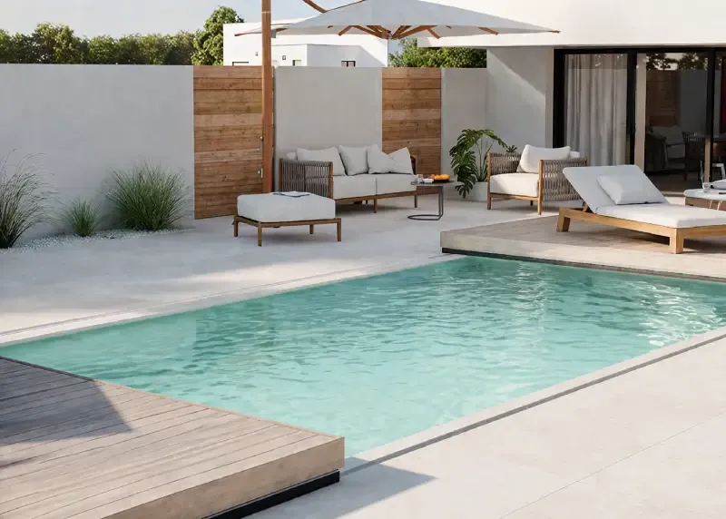 Plancher mobile coulissant permettant de recouvrir la piscine et de créer une terrasse.